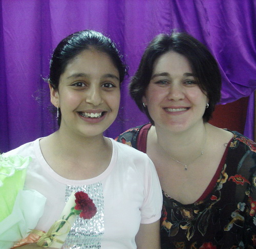 me with mra.agustina at the school's grade 5 graduation ceremoney