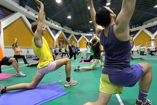 Stretch it out at Heyrobics indoor class located in Chaoyang Gymnasium; photo by Claire Bayrasy
