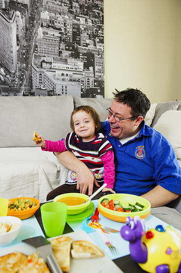 David Mitford is pictured with daughter Emily (2), enjoying a fresh quesadilla at home.