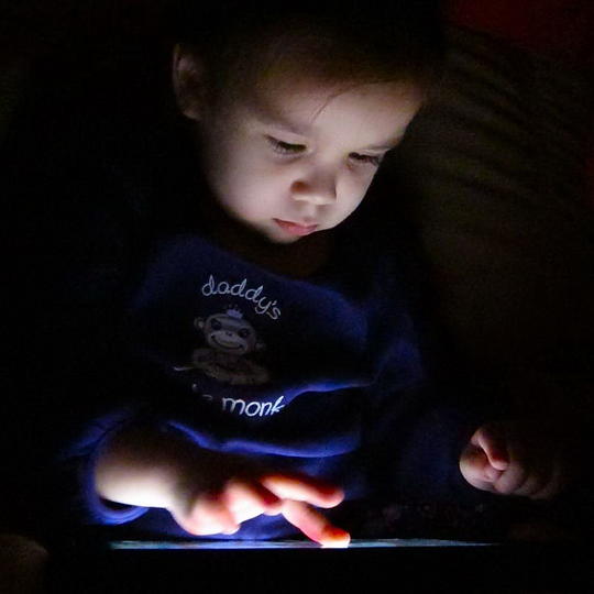 Reina in action with an iPad app