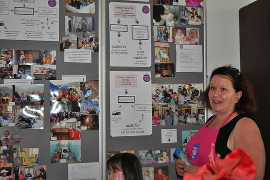 Leslie Simpson gives a tour and shows pictures of how Roundabout helps others.