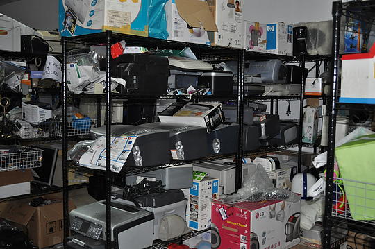 Electronics awaiting to be tested before selling -- the room is very large!