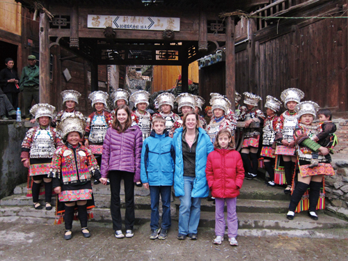 From left: Leah, Nathan, Stowe, and Martha receive a Datang Village welcome