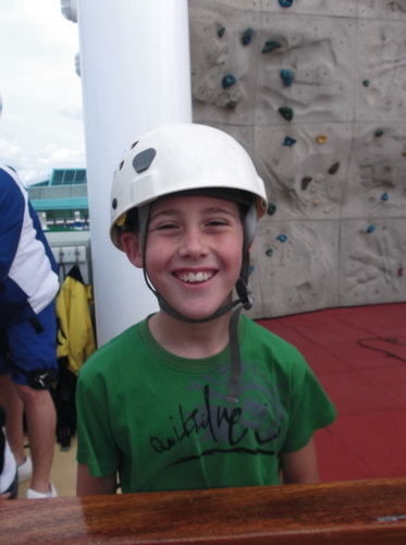 Ten-year-old Dayton rock climbs aboard the ship