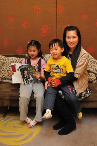 Jenny Chang sends her daughter Britney (7) to Shijia Hutong Elementary School
