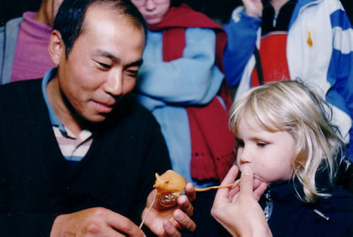 Blowing candy figurines at China Culture Center