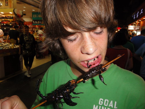 John is eating scorpions! Photo by Jennifer Bushman