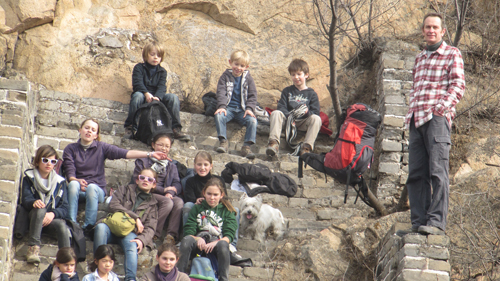 A young group of adventurers take a break with Dandelion Hiking