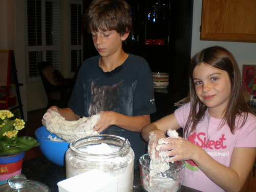 Julia and John having fun in the kitchen. Photo by Jennifer Bushman