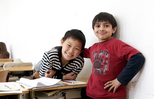 Zaren Hormzudiar with a friend at Fangcaodi International School