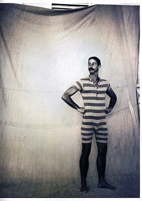 The glasses show that he's a sensitive, bookish type