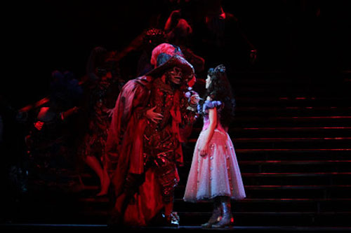 The Phantom (as the Red Death) and Christine Daaé at the New Year's masquerade ball