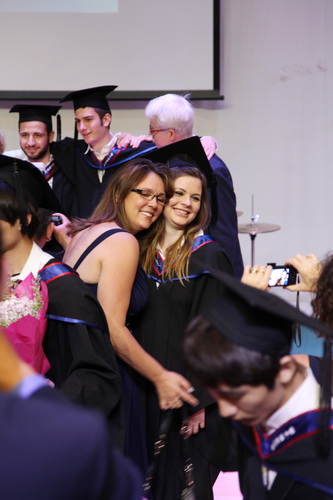 Post-ceremony picture taking in the auditorium