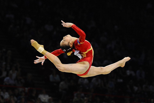 Chinese gymnast He Kexin soars at the 2008 Beijing Olympics