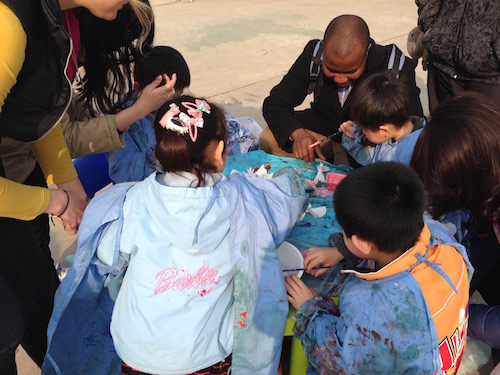 Ai Fei (with the Barbie jacket) painting at the Doudian campus