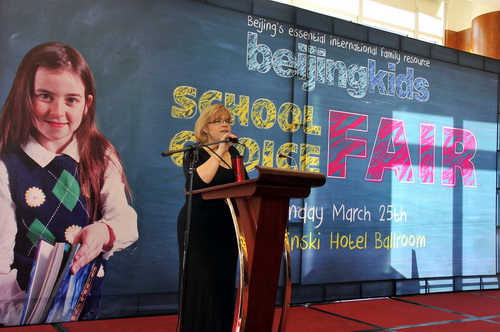 beijingkids Brand Manager Theresa Ahdieh announces a lucky draw winner