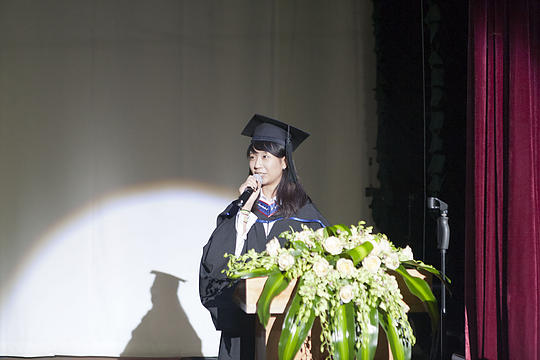 Valedictorian Jackie Chung speaks at graduation ceremony.