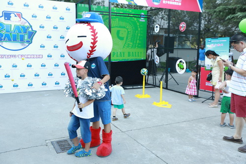 Getting a quick tip from the mascot on the best photo pose