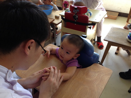 my son getting a massage