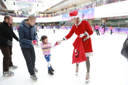 Mrs. Claus spreads the holiday cheer
