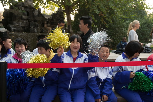 students from shunyi special school cheer on the f1 racers