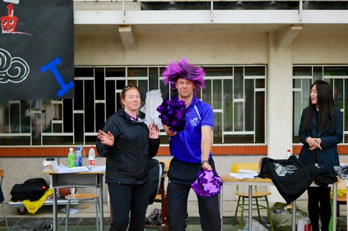 THIS teachers cheer on the home team