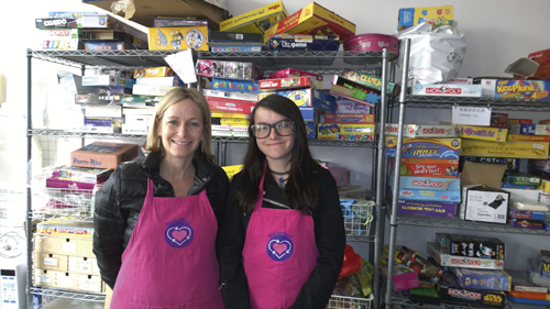 Volunteer Valerie MacEnroe and her daughter