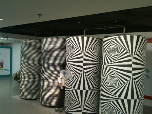 Optical illusion rollers - where kids can squeeze in for fun. Photo by Jerry Chan