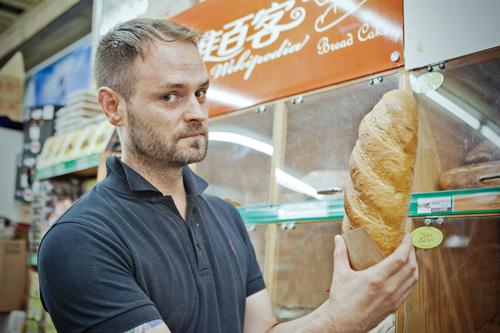 Man holding bread
