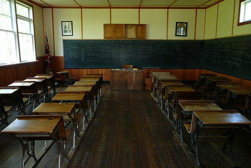 A very old school classroom with a blackboard