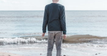 Boy looking over the sea