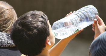Boy drinking water from a bottle