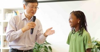 Jing Huang with a Daystar Academy student