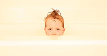 Wet Kid in Bathtub