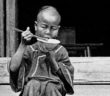 Child_Eating_Rice_with_Chopsticks