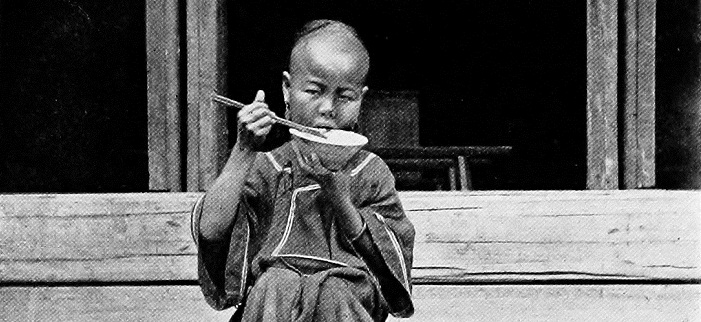 Child_Eating_Rice_with_Chopsticks